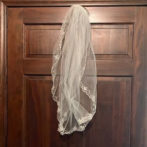 Mid-back length tulle veil